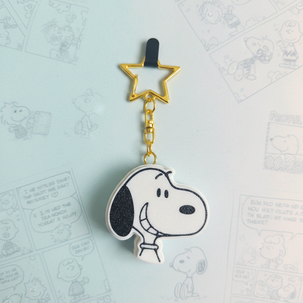 Snoopy llavero estrella dorada close-up